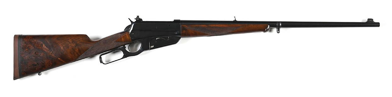 (C) DELUXE UPGRADED WINCHESTER MODEL 1895 LEVER ACTION RIFLE IN .405 WCF.: Dates to 1901. Factory research states this gun was serial numbered in 1901 and shipped on February 19, 1902. It left the factory as a standard .30 caliber rifle. It now sports a .405 barrel with nick