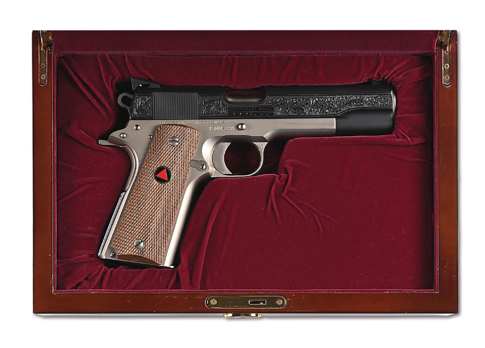 (M) ENGRAVED COLT CUSTOM COMBAT 10MM SEMI-AUTOMATIC PISTOL WITH BOX AND CASE.: One of around 400 were manufactured by the Colt Custom Shop circa 1988 with electroless nickel finish. The slide of this example was later finished in a matte blue and deeply engraved with shaded oak