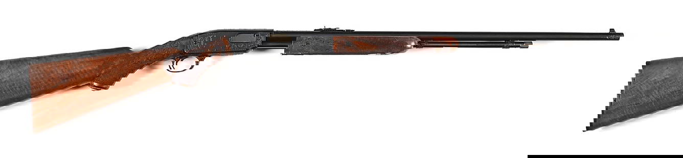 (C) DELUXE UPGRADED WINCHESTER MODEL 61 SLIDE ACTION RIFLE.: Dates to 1953. The frame is masterfully engraved with typical dual squirrels on branch vignette surrounded by fine American scroll. The right side features the Winchester pattern with two rabbits in a