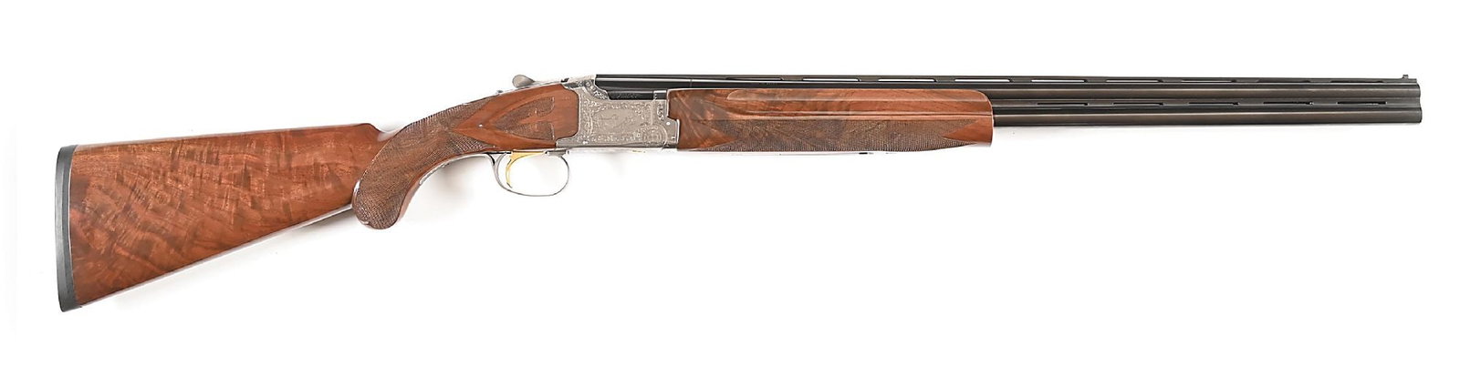 (M) RUFFED GROUSE SOCIETY WINCHESTER MODEL 101 20 BORE OVER UNDER SHOTGUN.: In 1984, Winchester made 250 "Grouse Guns" for the Ruffed Grouse Society. Features an engraved satin finished action and trigger guard featuring a pair of grouse on the left side, a setter with grouse