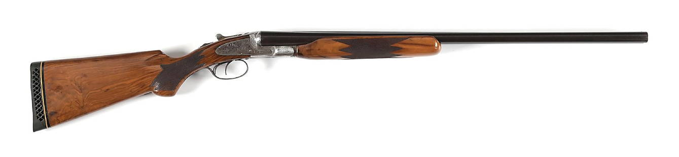 (C) L.C. SMITH FEATHER WEIGHT IDEAL GRADE 12 GAUGE SIDE BY SIDE SHOTGUN.: Factory letters as shipped to W.S. Brown & Co on August 1st, 1924, as an 12 gauge Ideal grade with 28" barrels, two triggers, and splinter forearm. Stamped "FW" for featherweight, "E" for ejectors, an