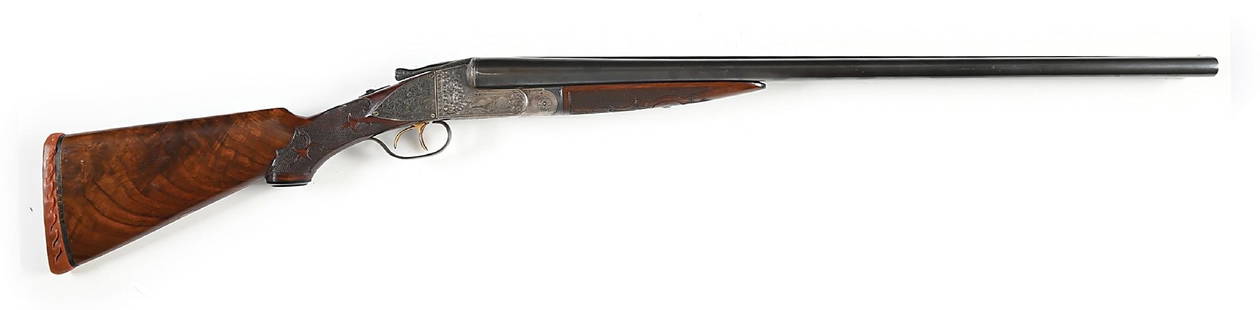 (C) DELUXE ENGRAVED GRADE 4 ITHACA FLUES SIDE BY SIDE 12 GAUGE SHOTGUN.: Dates to 1921. Grade 4 stamped inside frame. Features blued fluid steel barrels, matted rib, twin ivory bead sights, and ejectors. The boxlock action features added silver side plates, case coloring,