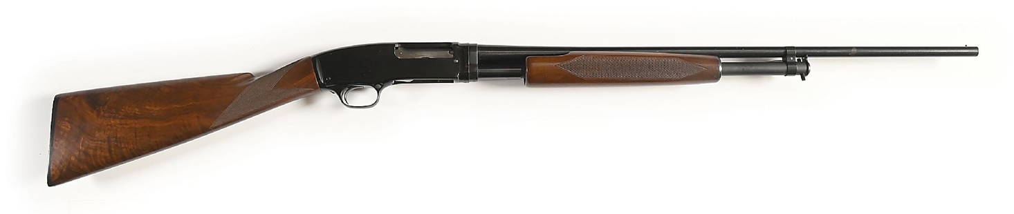 (C) SKEET GRADE WINCHESTER MODEL 42 SLIDE ACTION SHOTGUN (1963).: Manufactured in 1963. Base of frame is stamped Skeet. Barrel is stamped with mail order P but numbers are matching. This deluxe features the walnut stock with checkered straight grip and matching fore