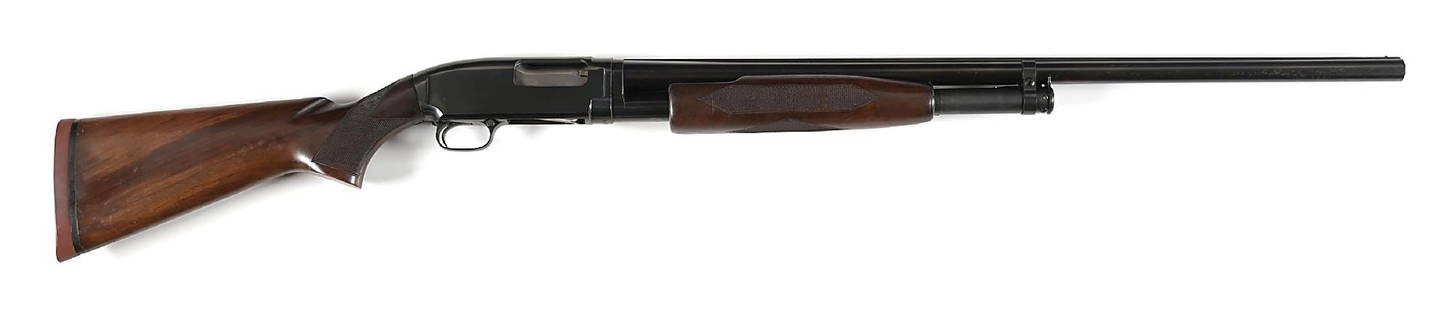 (C) DELUXE HEAVY DUCK WINCHESTER MODEL 12 SLIDE ACTION SHOTGUN.: The so called Heavy Duck was never factory stamped as such. It debuted in 1935, and this example was manufactured in 1955. Features a solid matted rib with a single bead front sight. Standard blue fin