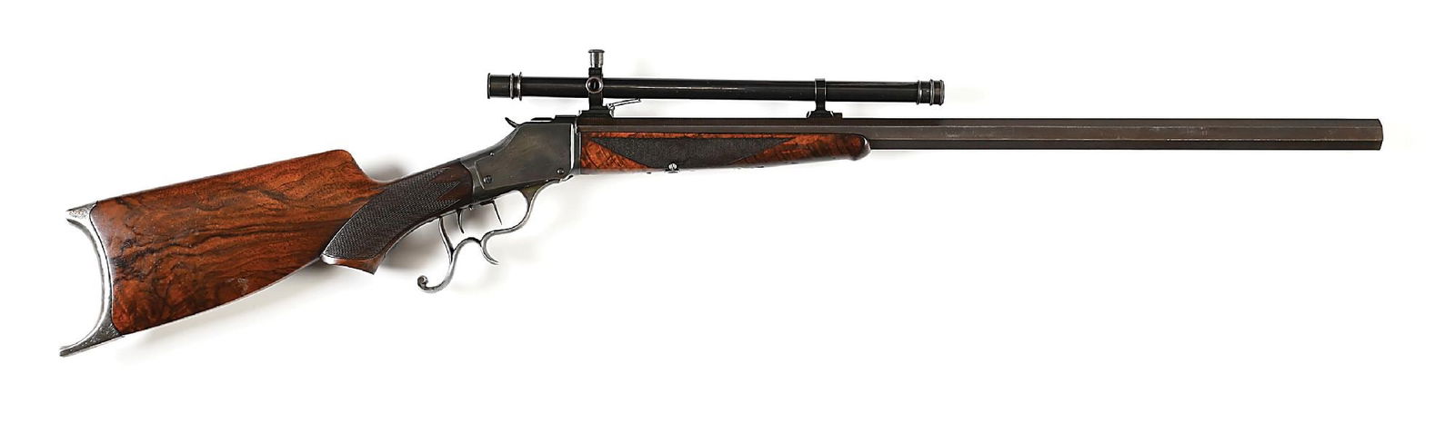 (A) DELUXE WINCHESTER MODEL 1885 HIGH WALL SINGLE SHOT SCHUETZEN RIFLE IN .32-40 WITH WINCHESTER: This special order rifle originally shipped from the warehouse January 20, 1898 with a No. 4 octagon barrel in .22 LR, Schutzen set triggers, spur lever, mid-range and wind gauge sights, checkered sto