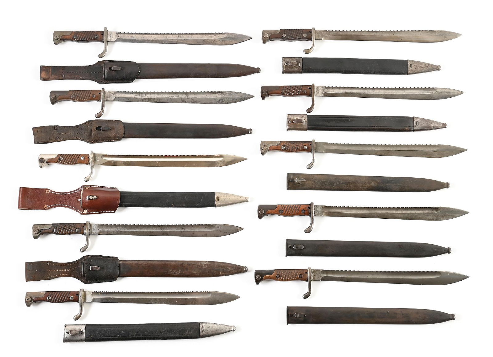 LOT OF 10: IMPERIAL GERMAN M98/05 SAWBACK BAYONETS.: Lot consists of: (A) Marked "ALEX.COPPEL / SOLINGEN". Blade is bright with blemishes and exhibits an older cleaning. Spine is marked with a crown / "W" / "10". "High ears" muzzle ring intact. Faint pr