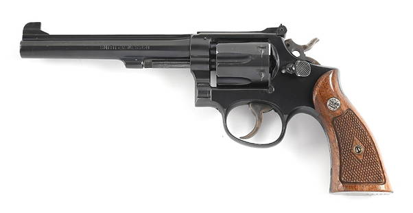 (C) SMITH & WESSON K-38 TARGET MASTERPIECE PRE-MODEL 14 SINGLE ACTION REVOLVER.: Manufactured in 1948. Finished in blue with case hardened hammer and trigger. Pinned barrel with serrated rib, Patridge front sight, and adjustable square notch rear. 5 screw K frame. Competition tune
