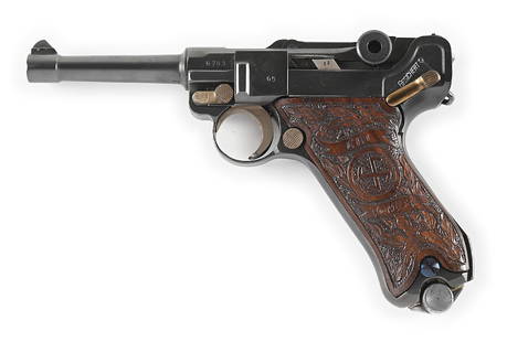 (C) G DATE S/42 P-08 LUGER SEMI-AUTOMATIC PISTOL.: G date over the chamber with S/42 on the front toggle. Aftermarket carved wood grips. All matching numbers gun except the magazine. Inverted V front sight with a V notch rear sight. CONDITION: This gu