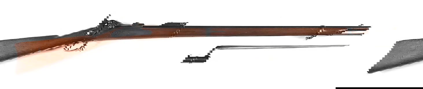 (A) OUSTANDING U.S. SPRINGFIELD MODEL 1884 TRAPDOOR RIFLE WITH BAYONET.: Barrel and mounts are finished in bright arsenal blue. Case hardened "US / MODEL / 1884" marked breech block. Bayonet lug blade front sight and Buffington rear. Full length oiled walnut stock with scr