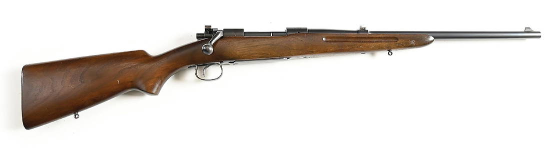 (C) WINCHESTER MODEL 54 BOLT ACTION CARBINE IN 7.65MM.: Receiver dates to 1928 and was catalogued from 1929 through 1936. This carbine features the walnut stock with plain pistol grip, first model steel butt plate, finger grooves on forearm, and sling eyes