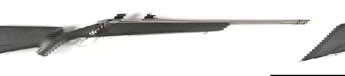 (M) STAINLESS SAKO MODEL 85 CARBONLIGHT BOLT ACTION RIFLE IN .243 WINCHESTER.