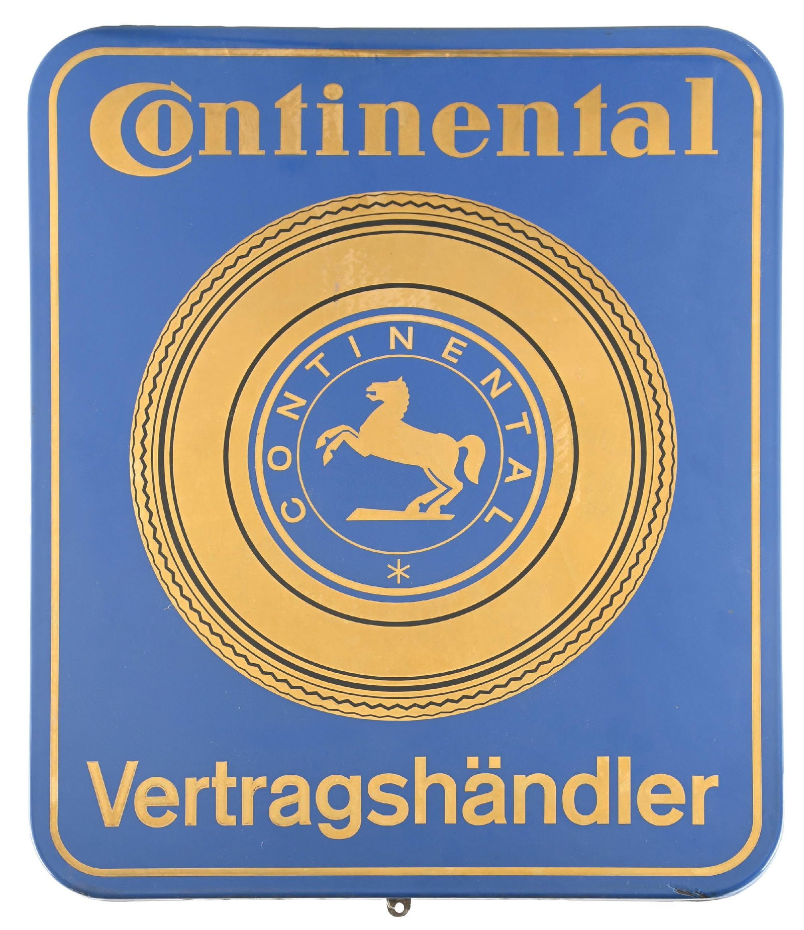 CONTINENTAL TIRES PORCELAIN SIGN W/ COOKIE CUTTER EDGE.: SSP. c. 1950s. CONDITION: Sign features deep blue porcelain with metallic gold lettering and seal graphic, reading "Continental Vertragshändler" (Authorized Dealer). Field remains exceptionally c