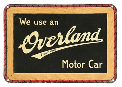 WE USE AN OVERLAND MOTOR CAR TIN SIGN.