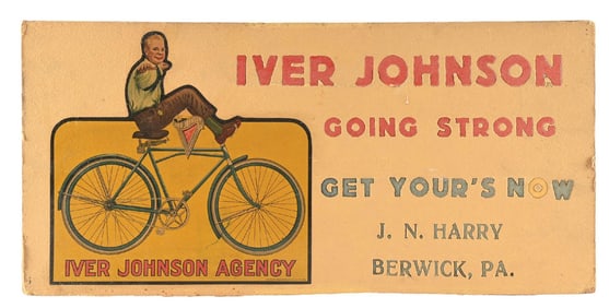 IVER JOHNSON BICYCLE AGENCY PRESSED CARDBOARD SIGN W/ BIKE RIDER GRAPHIC.