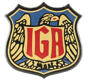 IGA GROCER EMBOSSED PORCELAIN SHIELD SIGN.