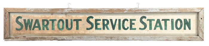 SWARTOUT SERVICE STATION TIN SIGN W/ ORIGINAL WOOD FRAME.