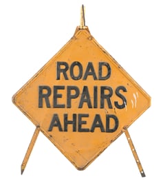 ROAD REPAIRS AHEAD STAMPED STEEL SIGN W/ TRIPOD BASE.
