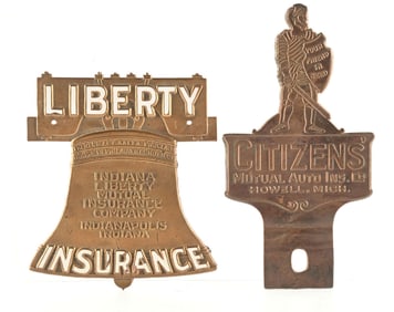 COLLECTION OF 2: CITIZENS & LIBERTY INSURANCE LICENSE PLATE TOPPED AND RADIATOR BADE.
