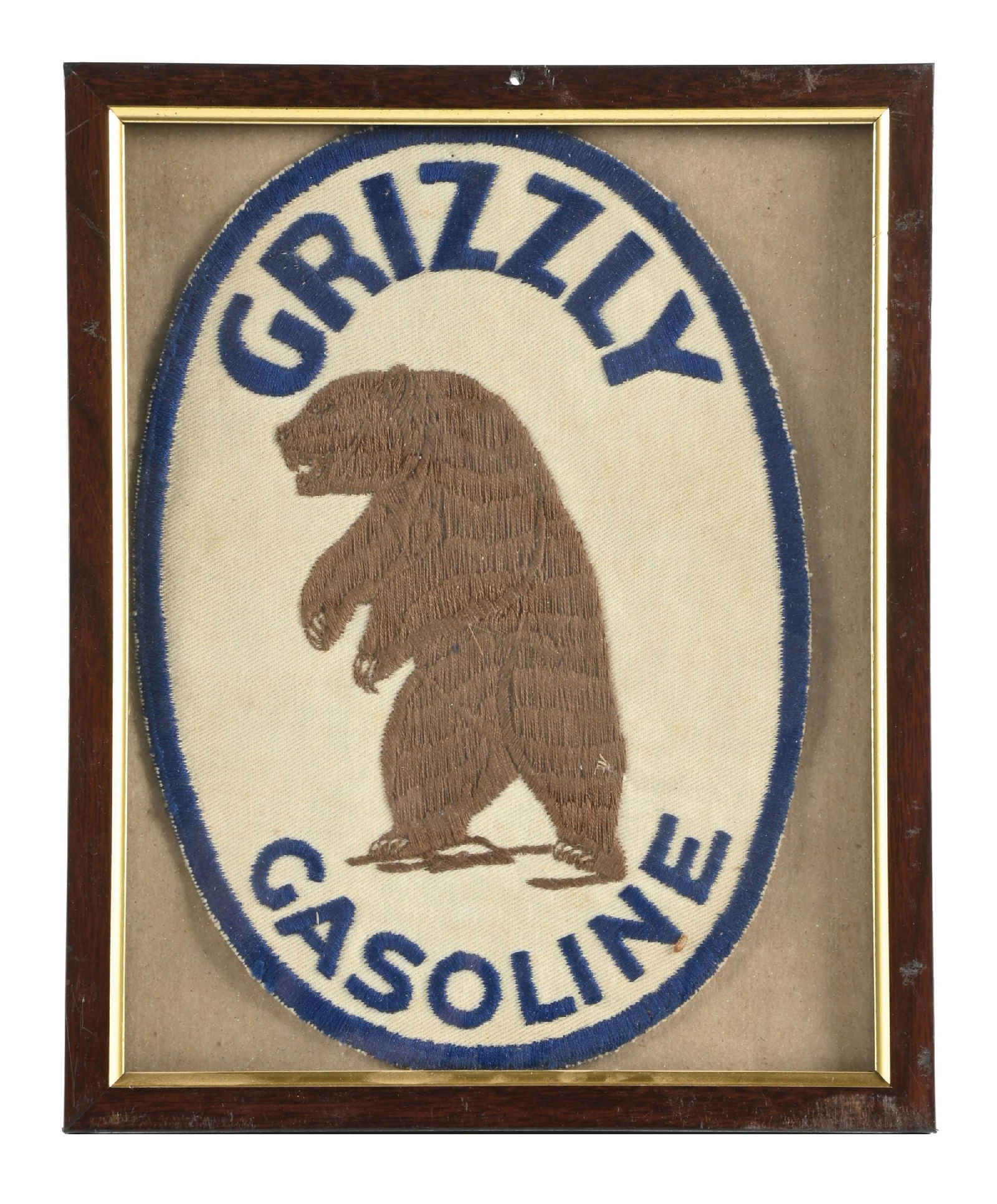 GRIZZLY GASOLINE FRAMED JACKET PATCH: Single Sided Stitched Jacket Patch for Grizzly Gasoline. CONDITION: Overall bright and clean showing light age wear with minimal stain marks. Framed behind glass, overall bright and well displaying. C