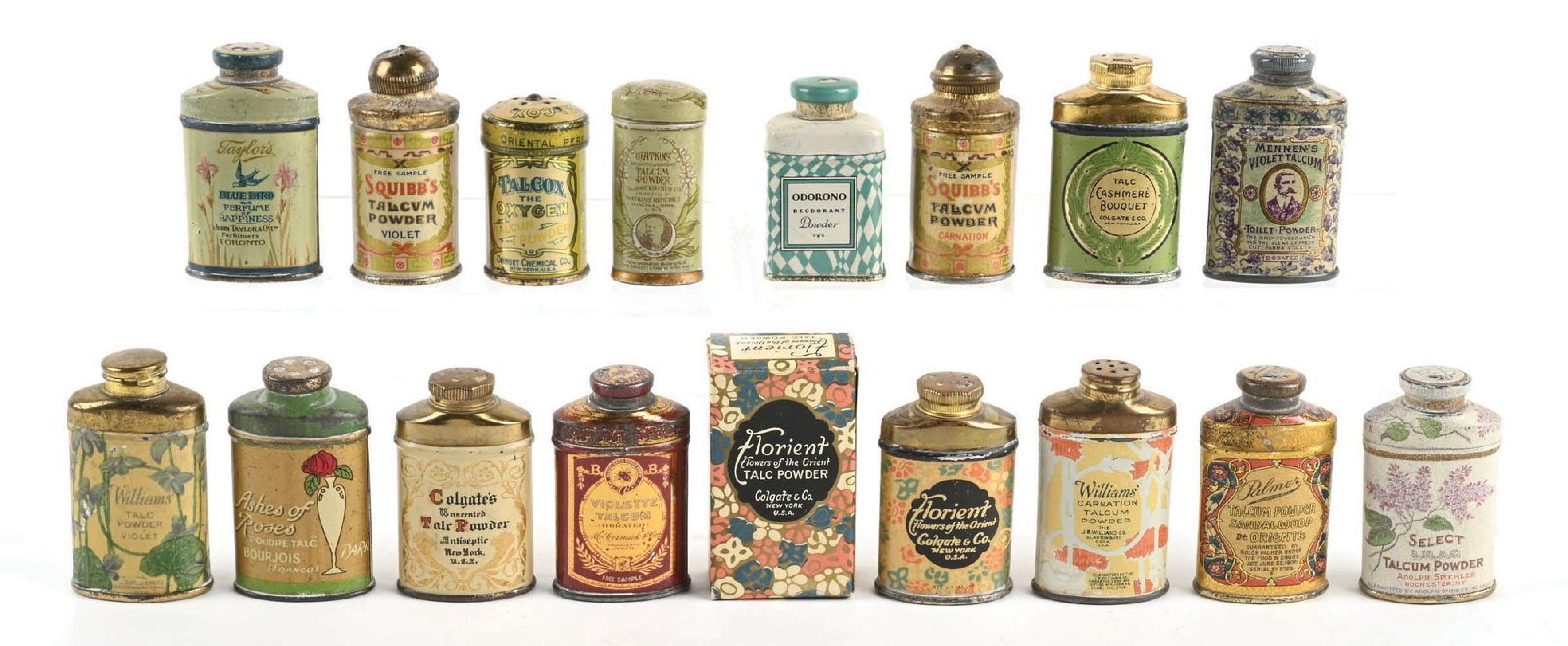 LARGE COLLECTION OF MINIATURE TALCUM POWDER TINS: A wonderful instant collection of these miniature talcum powder tins, featuring wonderful color and graphics. CONDITION: The tins show moderate wear and spots of color loss and scraping. They display 