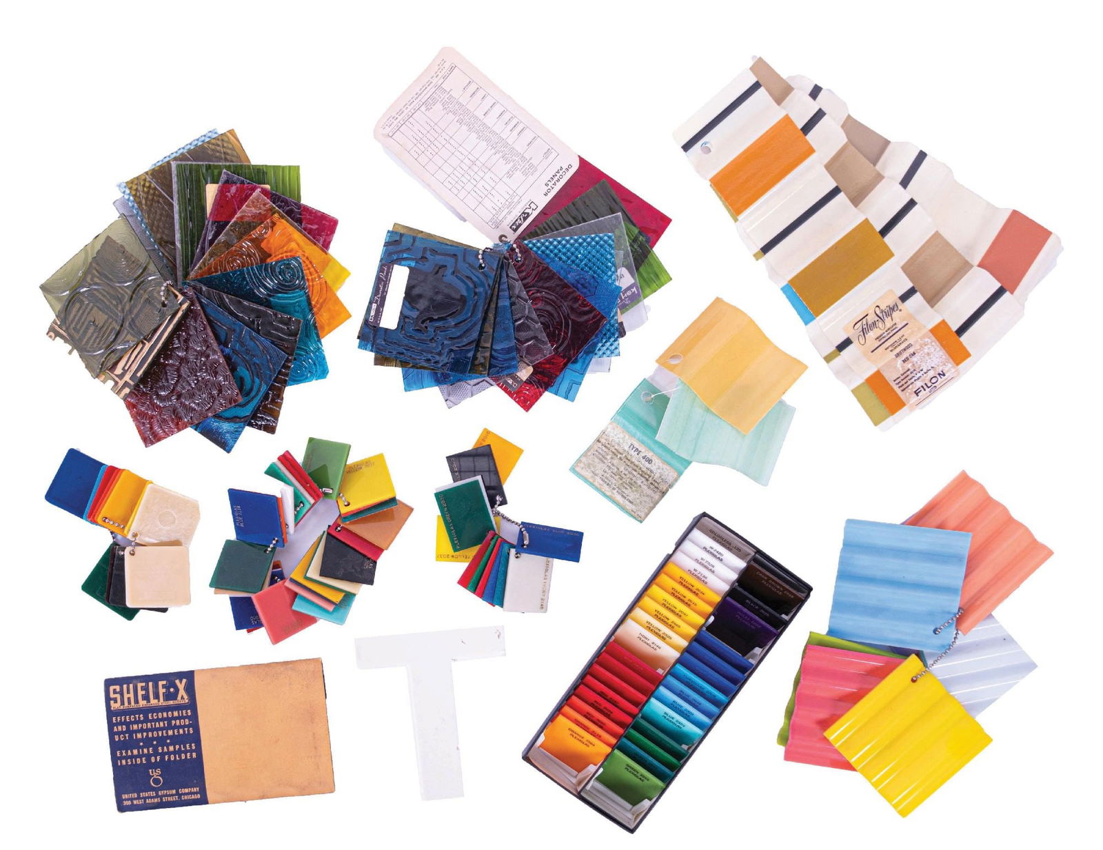 A COLLECTION OF PLEXIGLASS SALESMAN SAMPLES (1 of 1)