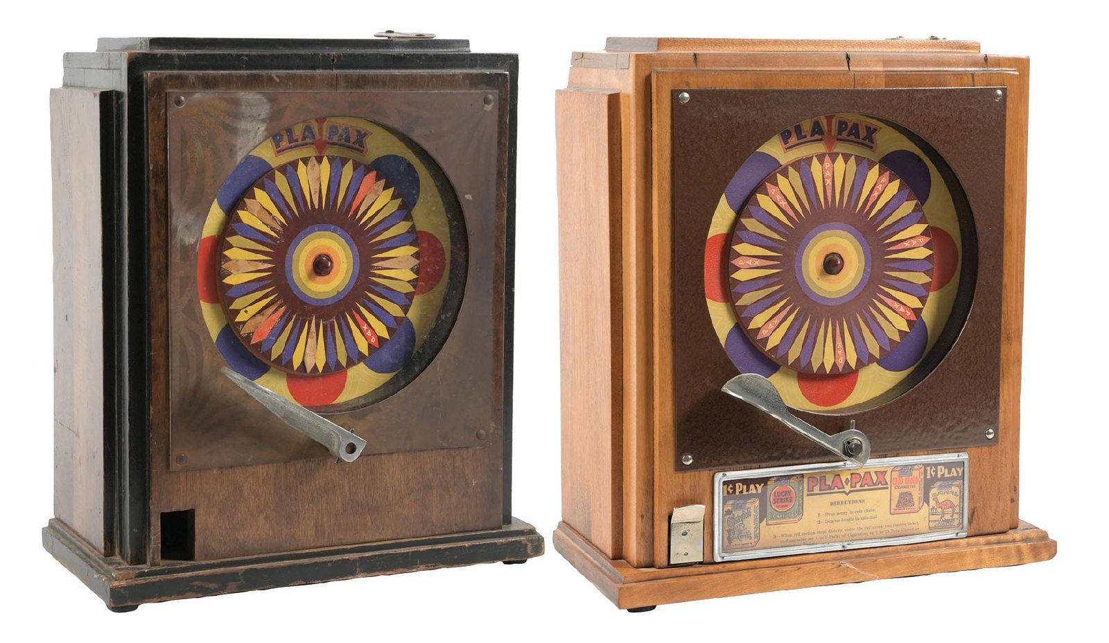 PAIR OF 1¢ AND 5¢ PLA-PAX TRADE STIMULATORS: C. 1940s. Made by Garden City Mfg. CONDITION: (A) Showing light wear with original finish, bright graphic wheel, no instruction label, operational and with keys. (B) Showing age cracks to the wooden c