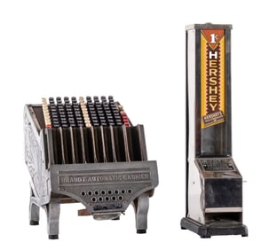PAIR OF COUNTRY STORE ITEMS BRANDT AUTOMATIC CASHIER AND 1¢ HERSHEY VENDING MACHINE