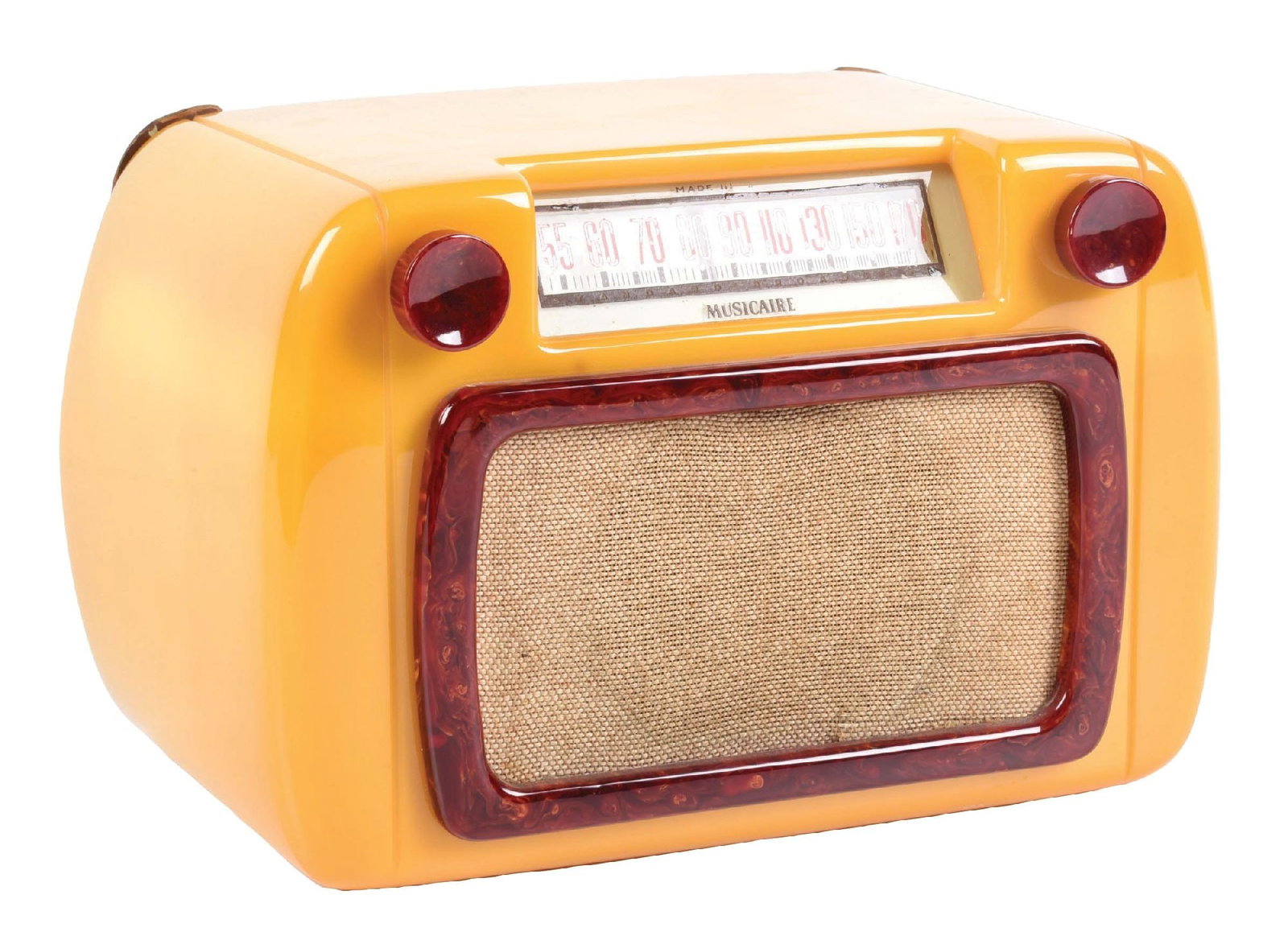 MUSICAIRE 284NB RADIO IN YELLO & OXBLOOD CATALIN: C. 1945. CONDITION: Yellow cabinet, marbleized oxblood knobs and grill surround have no cracks, chips, burns or repairs. Grill cloth, back panel, and Musicaire reverse painted dial with some wear are 