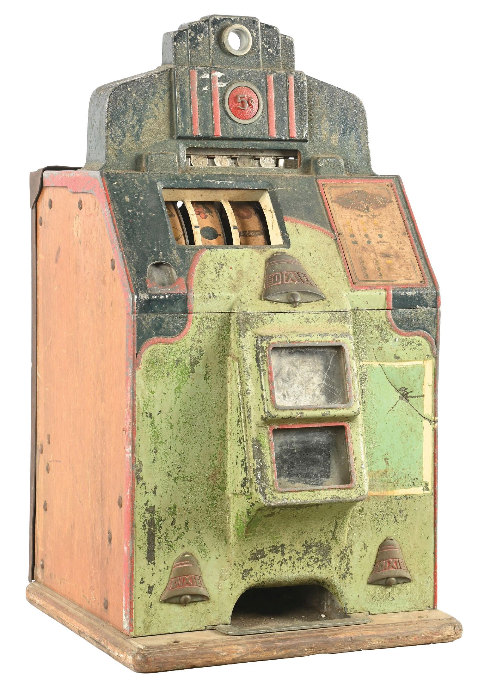 5¢ O.D. JENNINGS & CO. DIXIE BELL SLOT MACHINE: C. 1940. CONDITION: A project machine needing restoration. Has original reel strips award card, and back door with cash box. There is no bonnet, crack in the front casting, and some missing base wood.