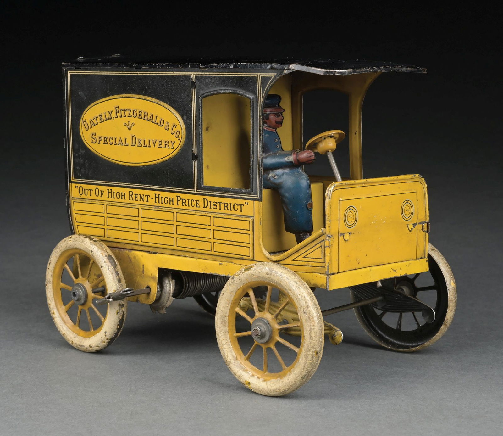 GERMAN TIN LITHO HANS EBERL GATELY FITZGERALD & CO. SPECIAL DELIVERY TRUCK: CONDITION: Original back doors, original driver. Some moderate wear to wheels, slight creasing on top of roof and some minor to moderate wear throughout. Very good to excellent condition overall. Dime