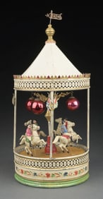 GERMAN DOLL CO. CLOCKWORK MERRY GO ROUND