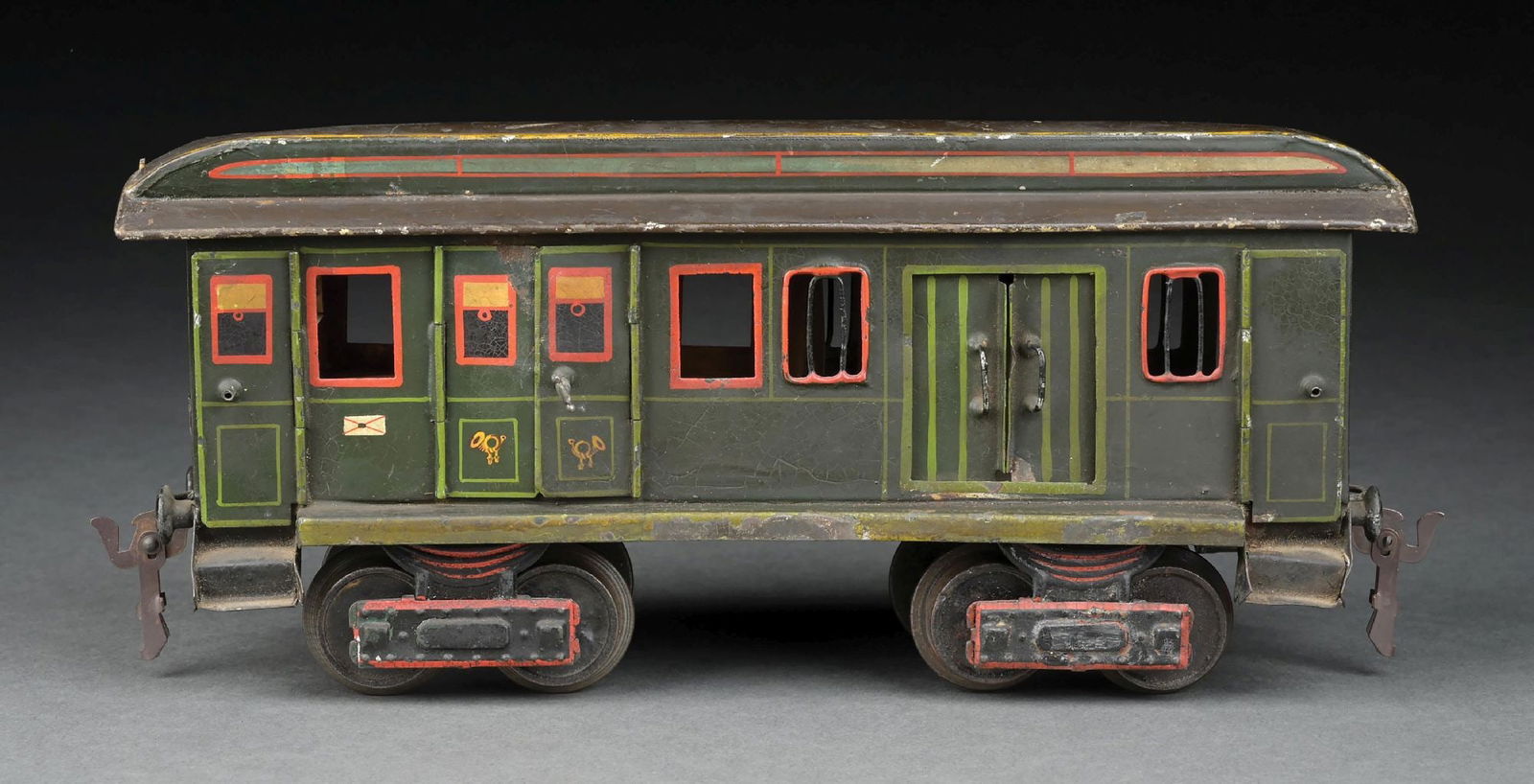 MARKLIN I GA. HAND-PAINTED 8-WHEEL BAGGAGE CAR: C. 1903-1904. CONDITION: Very good condition, may clean to a better grade. Missing three door handles. Dimensions: 11" x 3-1/2" x 5".