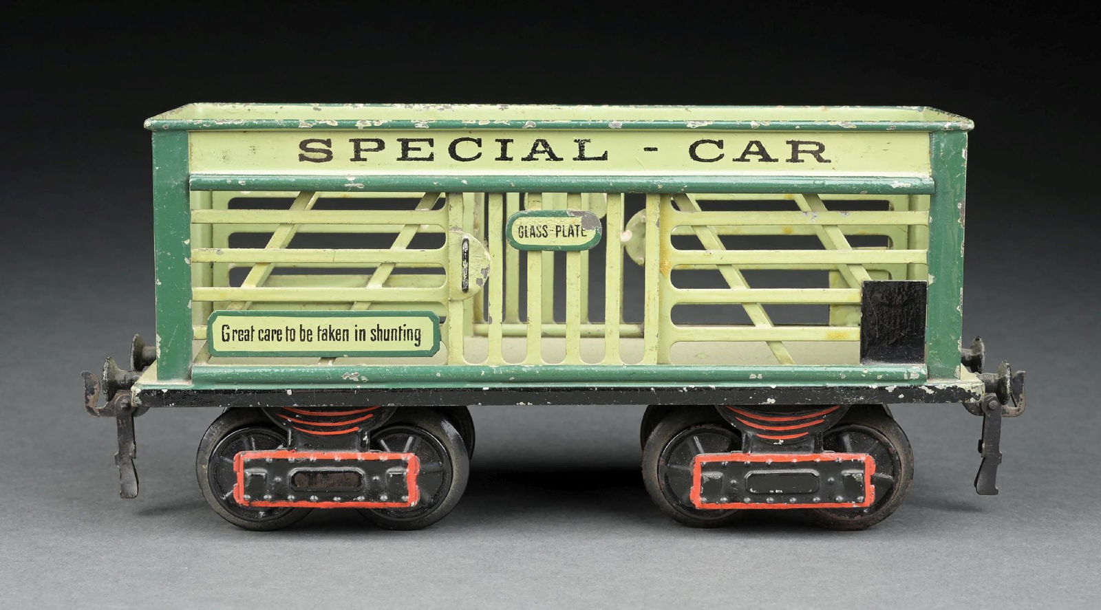 MARKLIN 1 GA. HAND-PAINTED SPECIAL GLASS CARRYING CAR: C. 1905-1906. CONDITION: Excellent to near mint. Dimensions: 10-1/2" x 3" x 4-1/2".
