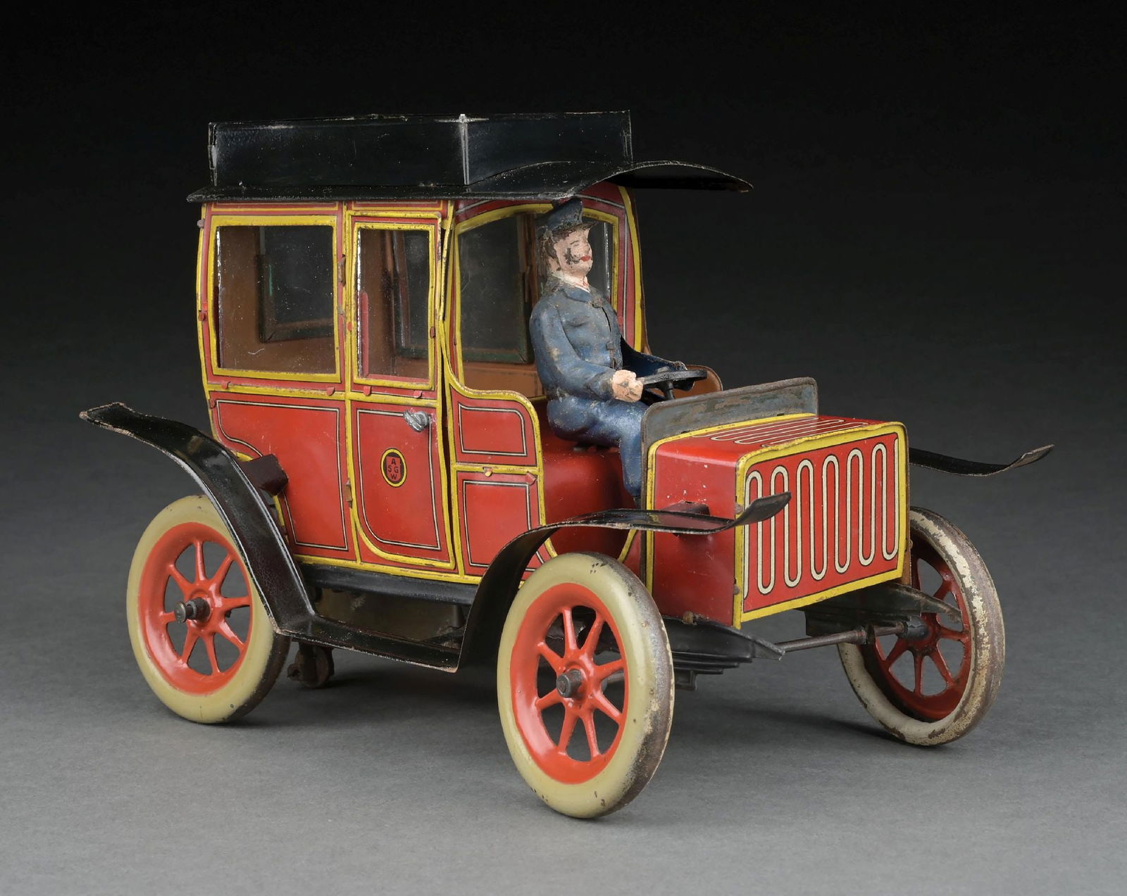 RARE GERMAN GUNTHERMANN TIN LITHO WIND-UP AUTOMOBILE: Opening doors. Marked "SG" on doors. Has bellows on bottom. An unusual wheel on rear towards the end of the mechanism. CONDITION: Original hand-painted driver. Other than some wear to the wheels, the
