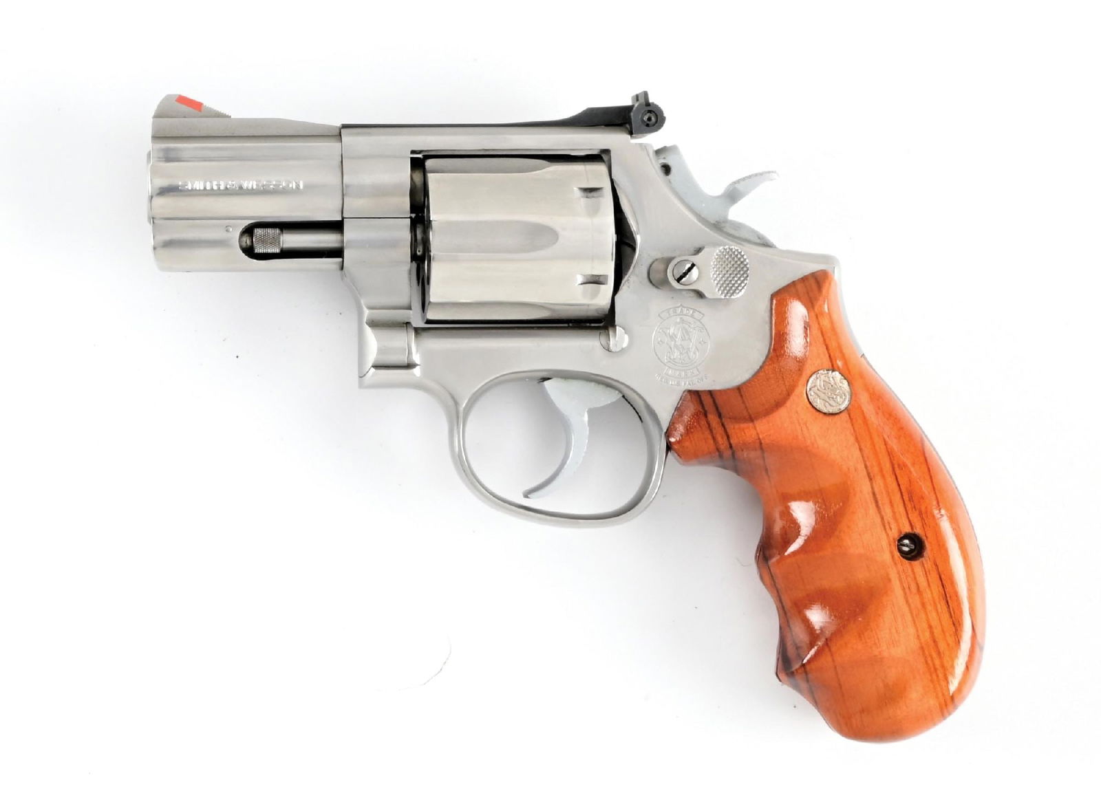 (M) SMITH & WESSON MODEL 686-1 DOUBLE ACTION REVOLVER.: Partridge front sights with a micrometer click adjustable rear, rosewood finger grooved combat grips. CONDITION: Excellent, shiny bore with crisp rifling. Barrel Length: 2 - 1/2" Caliber/Bore: .357 Ma