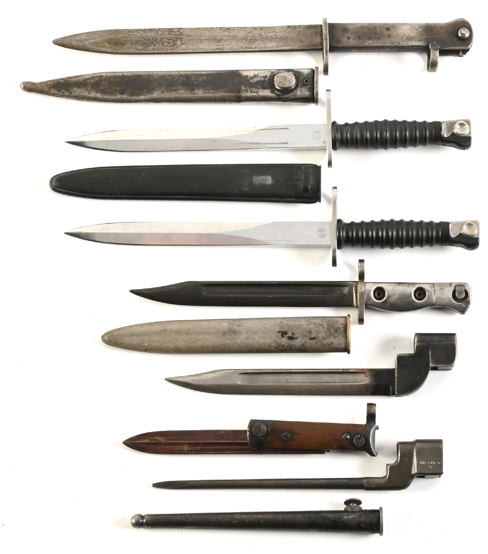 LOT OF 7: VARIOUS EUROPEAN BAYONETS.: Lot consists of: (A) FAL ersatz bayonet numbered "25086". (B) Swiss M57 bayonet with scabbard marked "W / 139347" on the ricasso. (C) Swiss M57 bayonet marked "W / 285859" on the ricasso. (D) British