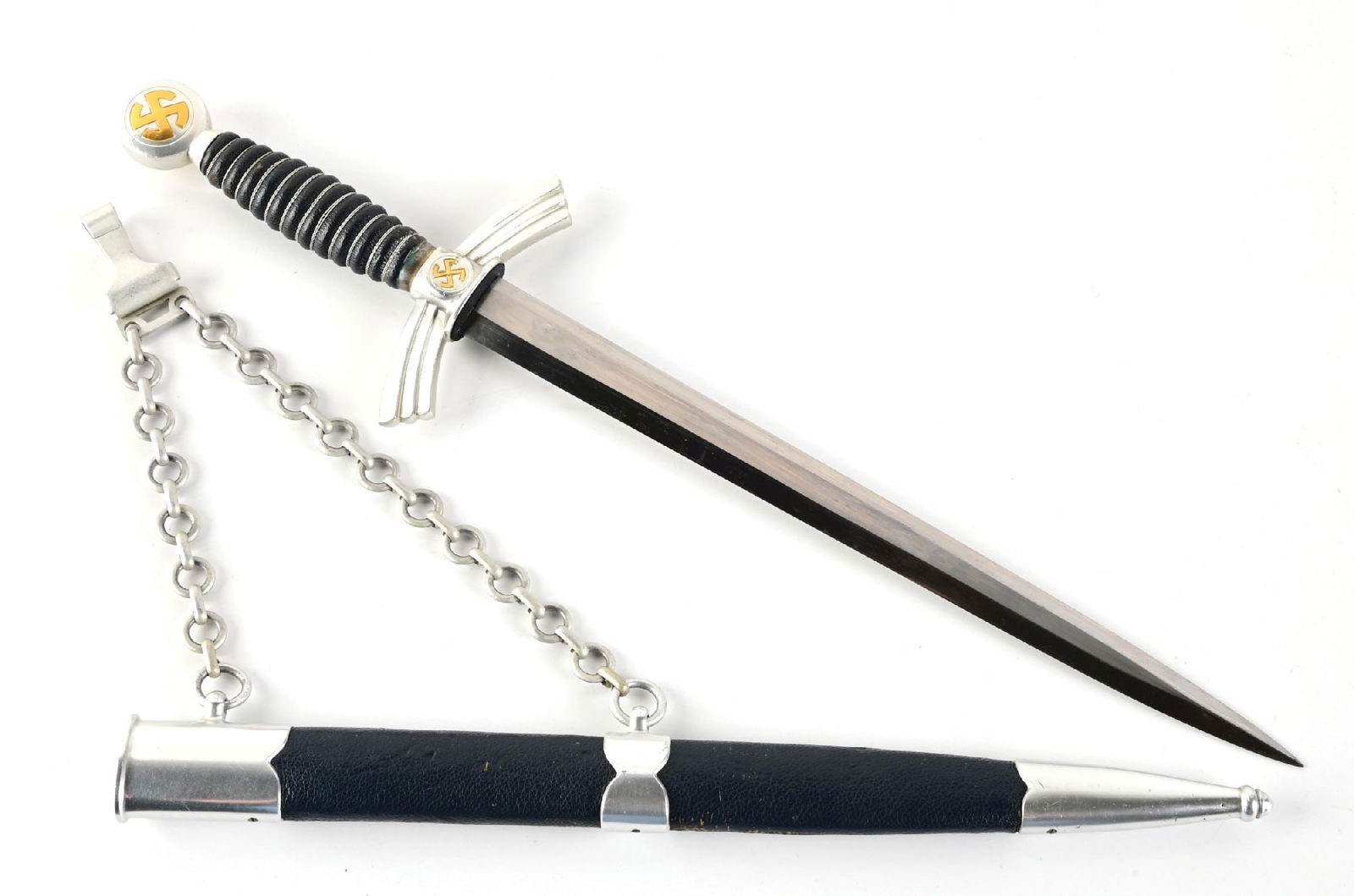 GERMAN WWII 1ST MODEL LUFTWAFFE DAGGER.: Luftwaffe 1st model dagger with an unmarked nickel plated blade that exhibits light runner marks, light freckling, and scattered blemishes. Aluminum fittings exhibit light wear and the swastikas retai