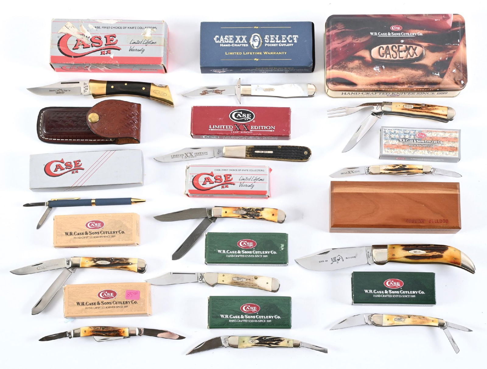 LOT OF 13: BOXED CASE FOLDING KNIVES.: Lot consists of 13 Case folding knives contained in their original boxes. Models include a Hobo fork and knife folder, Cheetah with mother of pearl scales, Shark Tooth, 6143, 5254 Trapper, boxed pen,