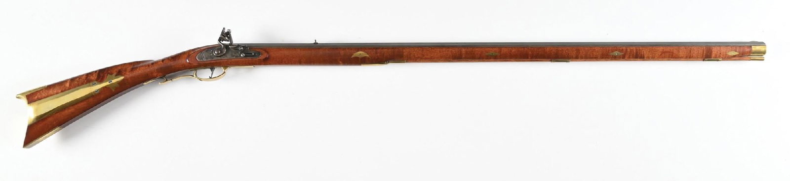 (A) CONTEMPORARY FULL STOCK KENTUCKY FLINTLOCK RIFLE.: No visible maker. Features a heavy octagon barrel in the white, wind drift rear blade, no markings on lock, single trigger, and a full length stock with brass furniture. CONDITION: Fine. Shows only so