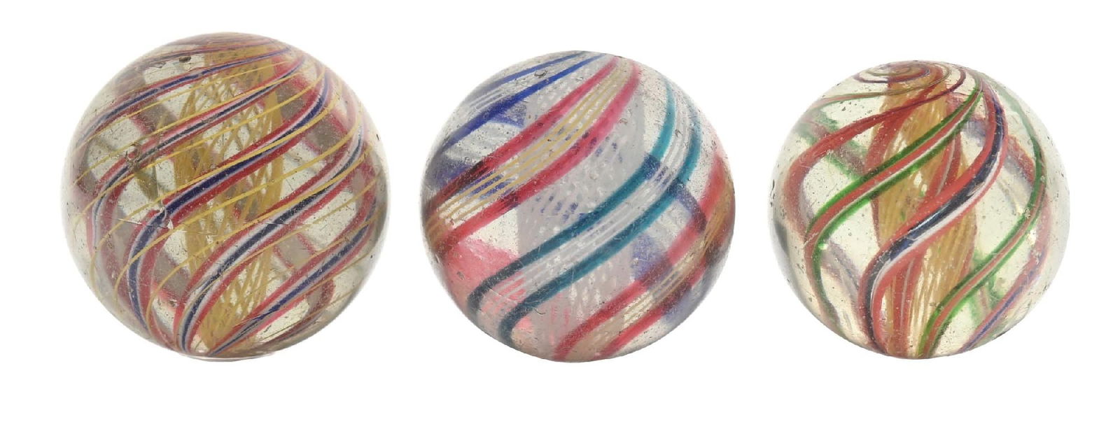 LOT OF 3: GERMAN SWIRLED MARBLES: The smallest swirl is 2" and the largest swirl is 2-1/8". All three are in very good condition with a number of small hits. Condition: (Very Good) Dimensions: Largest: 2" Dia. CORRECTION: Marble has b