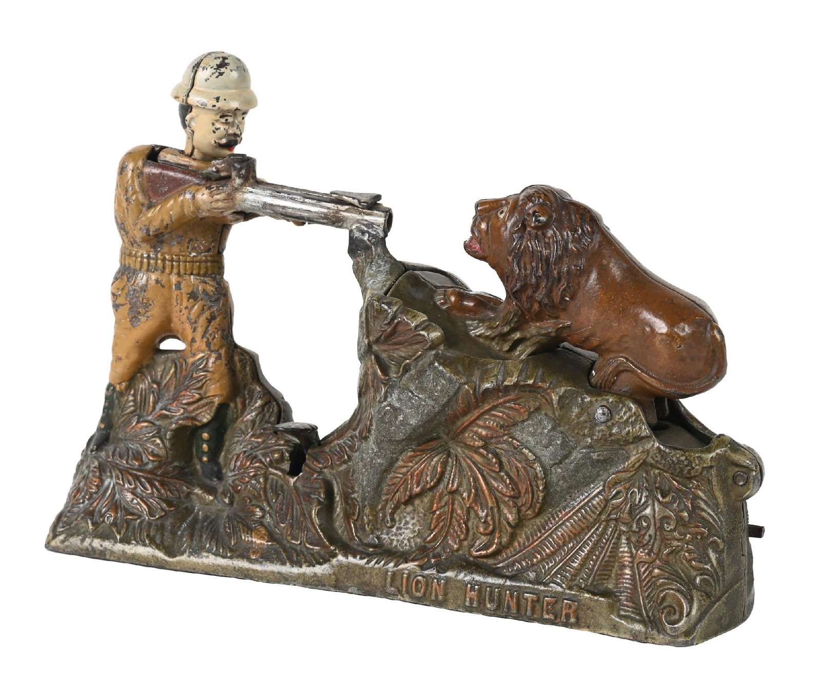J. & E. STEVENS LION HUNTER BANK: C. 1911. Tip end of gun repaired and touched-up. Bank is otherwise original and in good working condition, with a fair amount of mica remaining on the rock surface. Condition: (Very Good - Excellent).