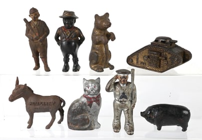 LOT OF 8: CAST IRON STILL BANKS