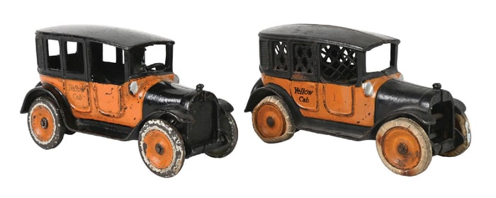 LOT OF 2: CAST IRON YELLOW CABS
