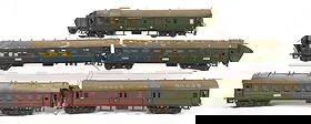 LOT OF 5: VARIOUS EUROPEAN-STYLE GERMAN MARKLIN O GA. PASSENGER CARS: C. 1930s-1940s. Includes a Mitropa and four other passenger cars. One car is missing wheels and trucks. Various conditions. Condition: (Very Good). Dimensions: Each: 15 - 1/4" x 2 - 1/2" x 3 - 1/2".