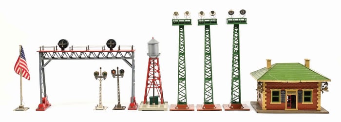 LOT OF 9: LIONEL PRE & POST-WAR ACCESSORIES & 3 M.T.H. FLOODLIGHT TOWERS