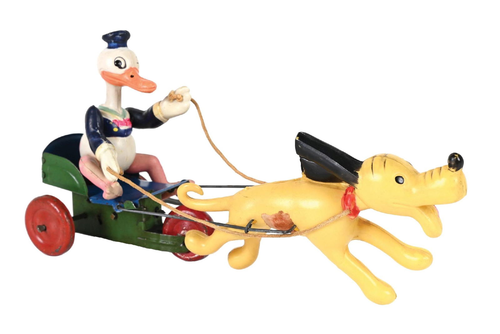 EARLY JAPANESE PRE-WAR CELLULOID PLUTO PULLING DONALD DUCK IN CART: Both figures are celluloid, cart and wheels are tin litho. Partial sticker on Pluto's body. Marked "Made in Japan" underneath Pluto's stomach. Condition: (Very Good - Excellent). Dimensions: 9" x 2 -