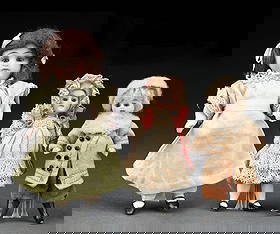 LOT OF 3: VERY NICE SMALL ALL BISQUE DOLLS: (A) The two smaller ones, which are identical in nature other than one is dressed as a boy and the other a girl. Both with open heads with permanently fixed tiny glass bead eyes, closed mouths, one-pi