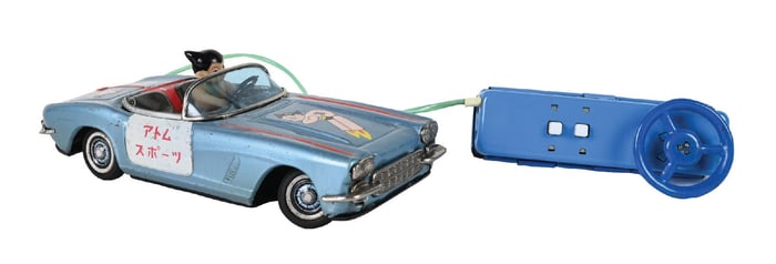 JAPANESE TIN LITHO BATTERY-OPERATED REMOTE CONTROL ASTRO BOY DRIVING CORVETTE CAR