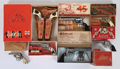 LOT OF 8: AMERICAN-MADE VINTAGE CAP GUNS W/ BOXES & BOX OF CAPS