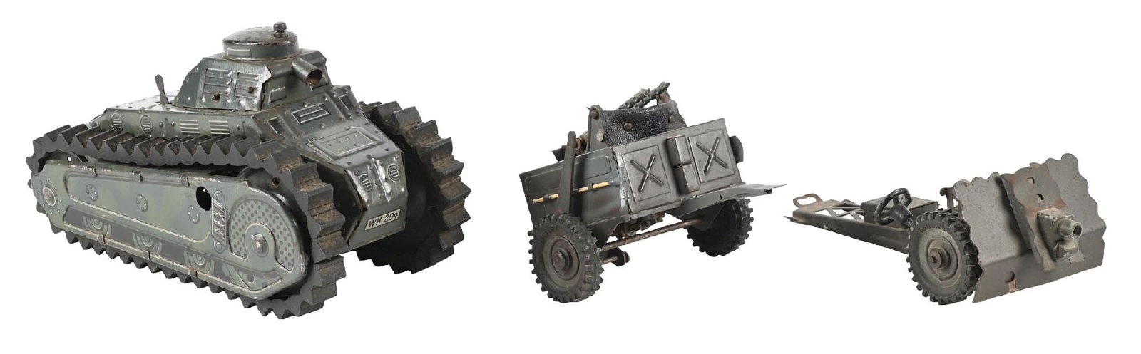 GERMAN TIN LITHO HAUSER WWII-TYPE TANK: It pulls a cannon gun and carrier with two machine guns. Marked "Hauser" on black rubber tires and "WH" on tank. It looks to have original treads. It has some general to moderate wear throughout. Cond